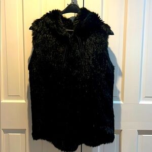 Sleeveless fur vest with playful hood. New w/tags